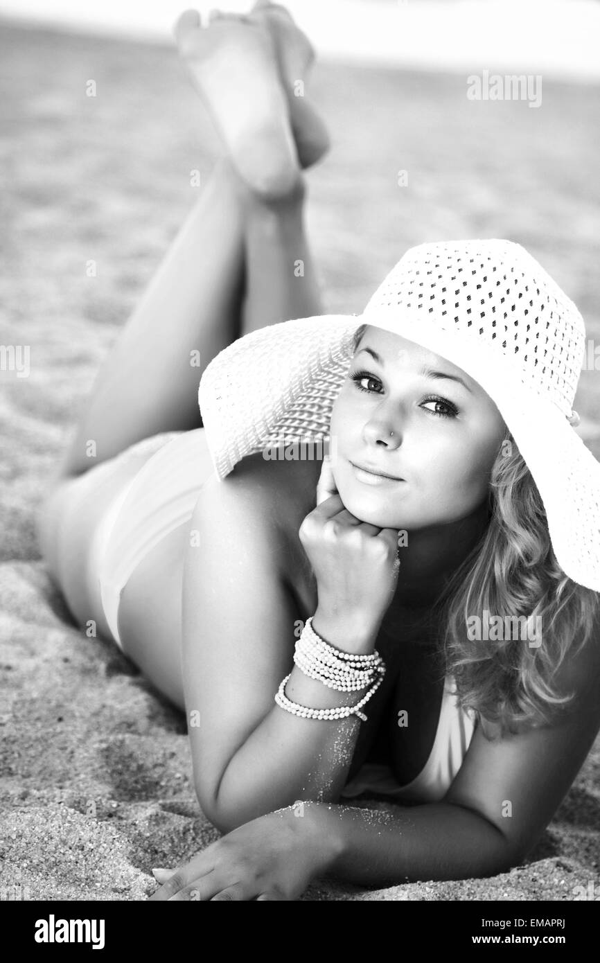 Sunbathing beach black white hires stock photography and images Alamy