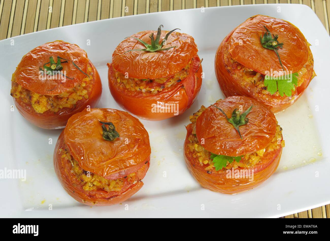 baked stuffed tomatoes with meat and rice Stock Photo