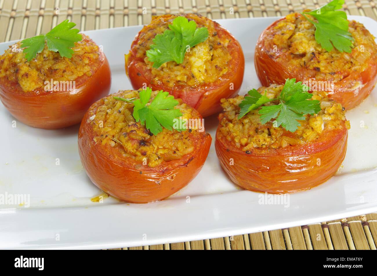 baked stuffed tomatoes with meat and rice Stock Photo