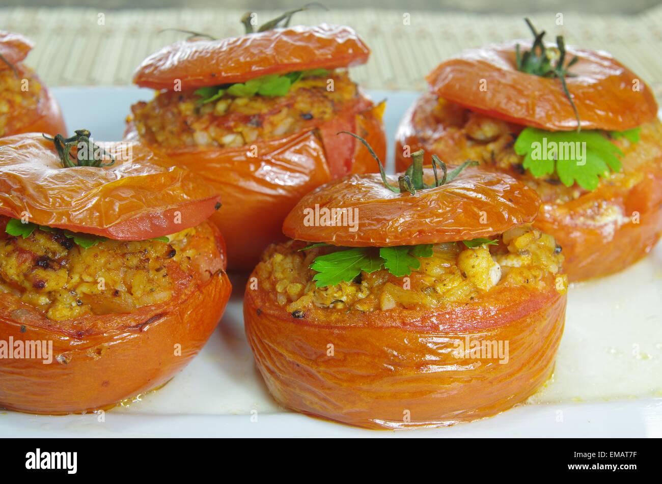 baked stuffed tomatoes with meat and rice Stock Photo