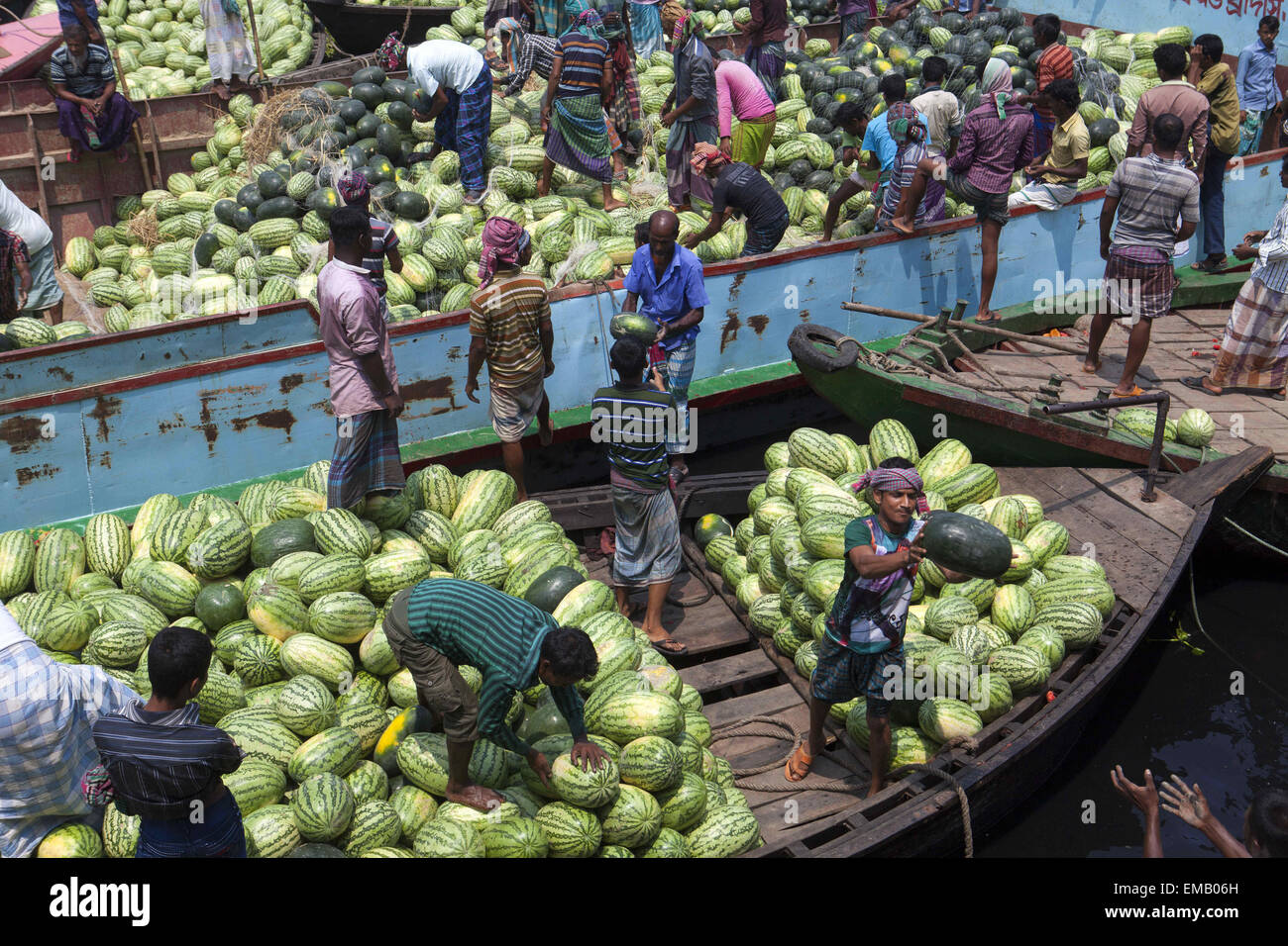 Dhaka, Bangladesh. 18th Apr, 2015. Laborers unloading watermelons from