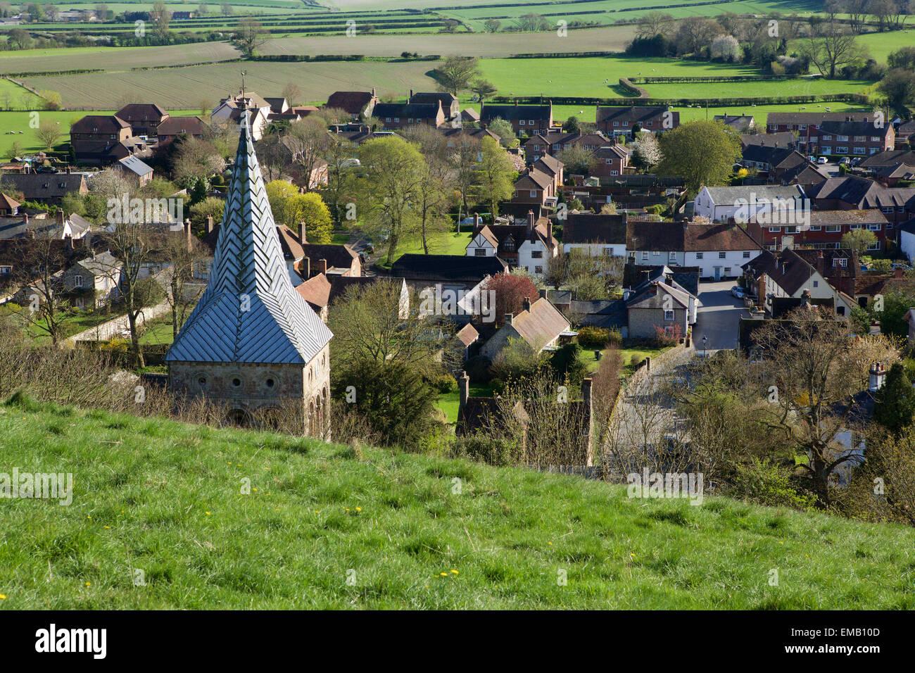 View of East Meon from the hill behind the Church. High angle shot looking down on the village and country beyond. Stock Photo