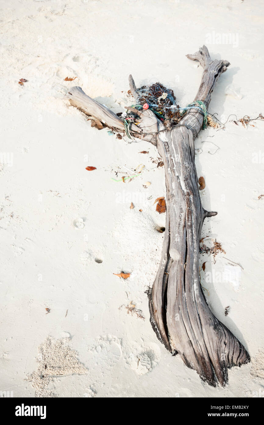 Rubbish washed up on the white sand beach in Cambodia, Asia. Stock Photo