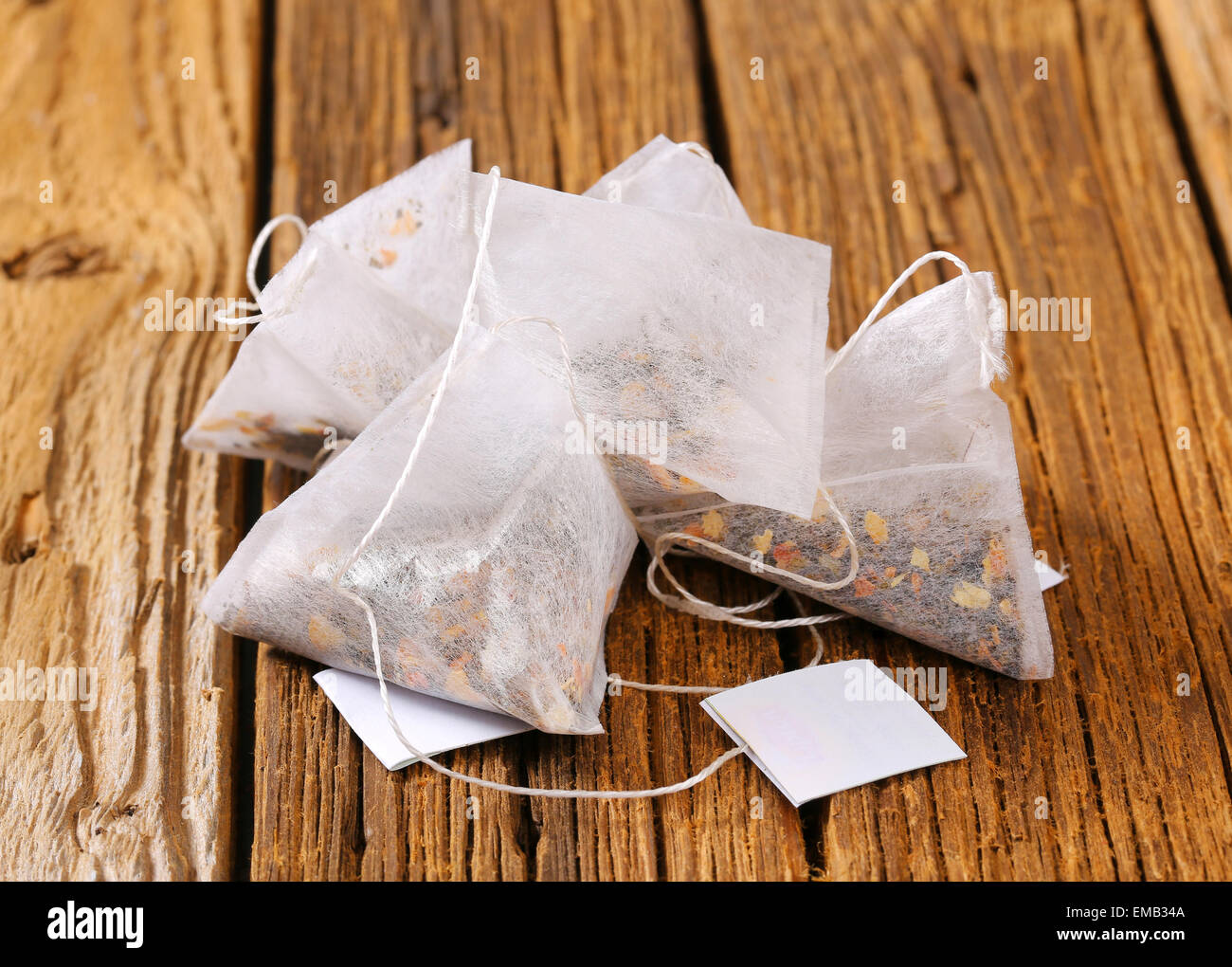 Jasmine tea bags on wood Stock Photo Alamy
