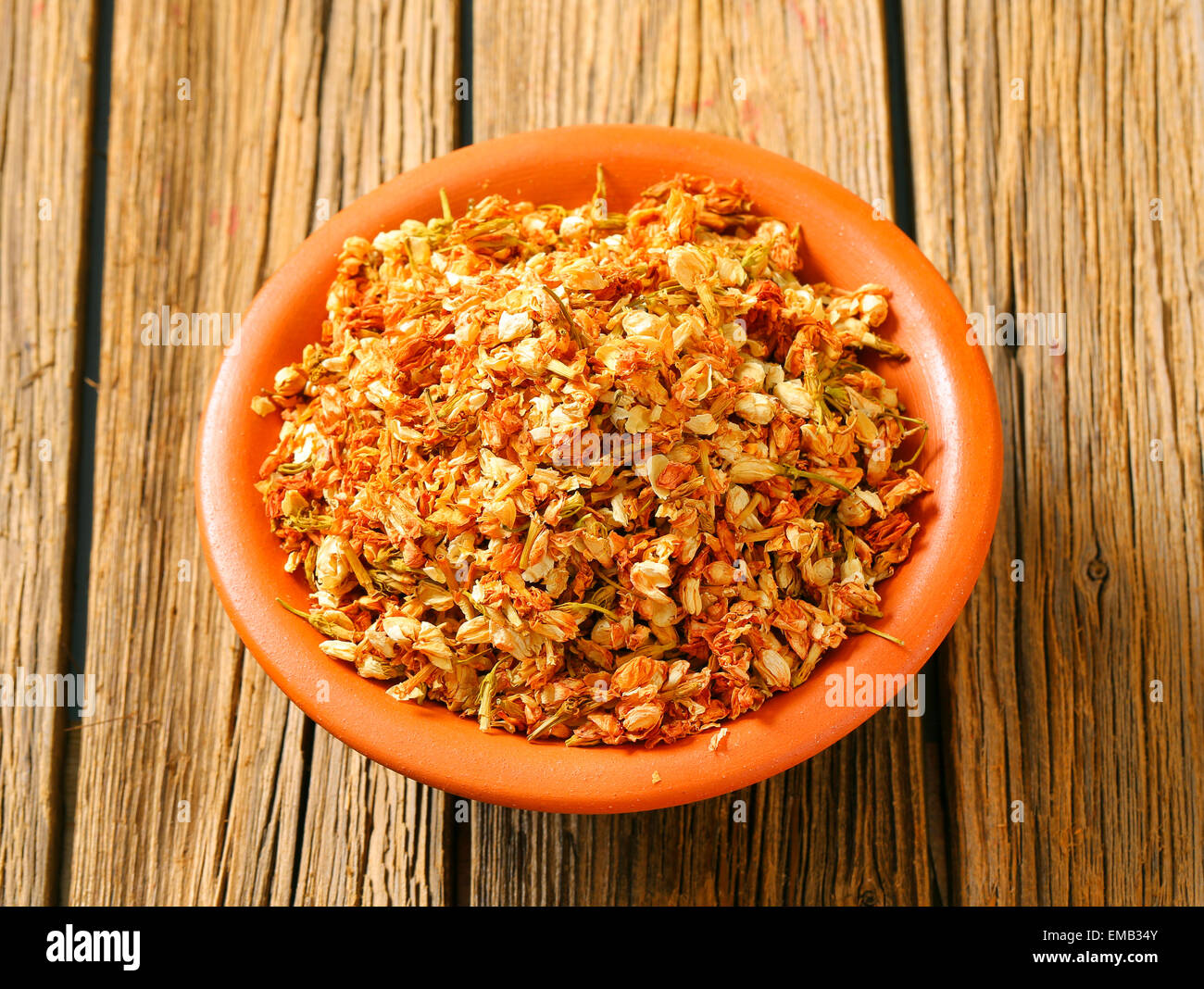 Bowl of dried jasmine flowers Stock Photo Alamy