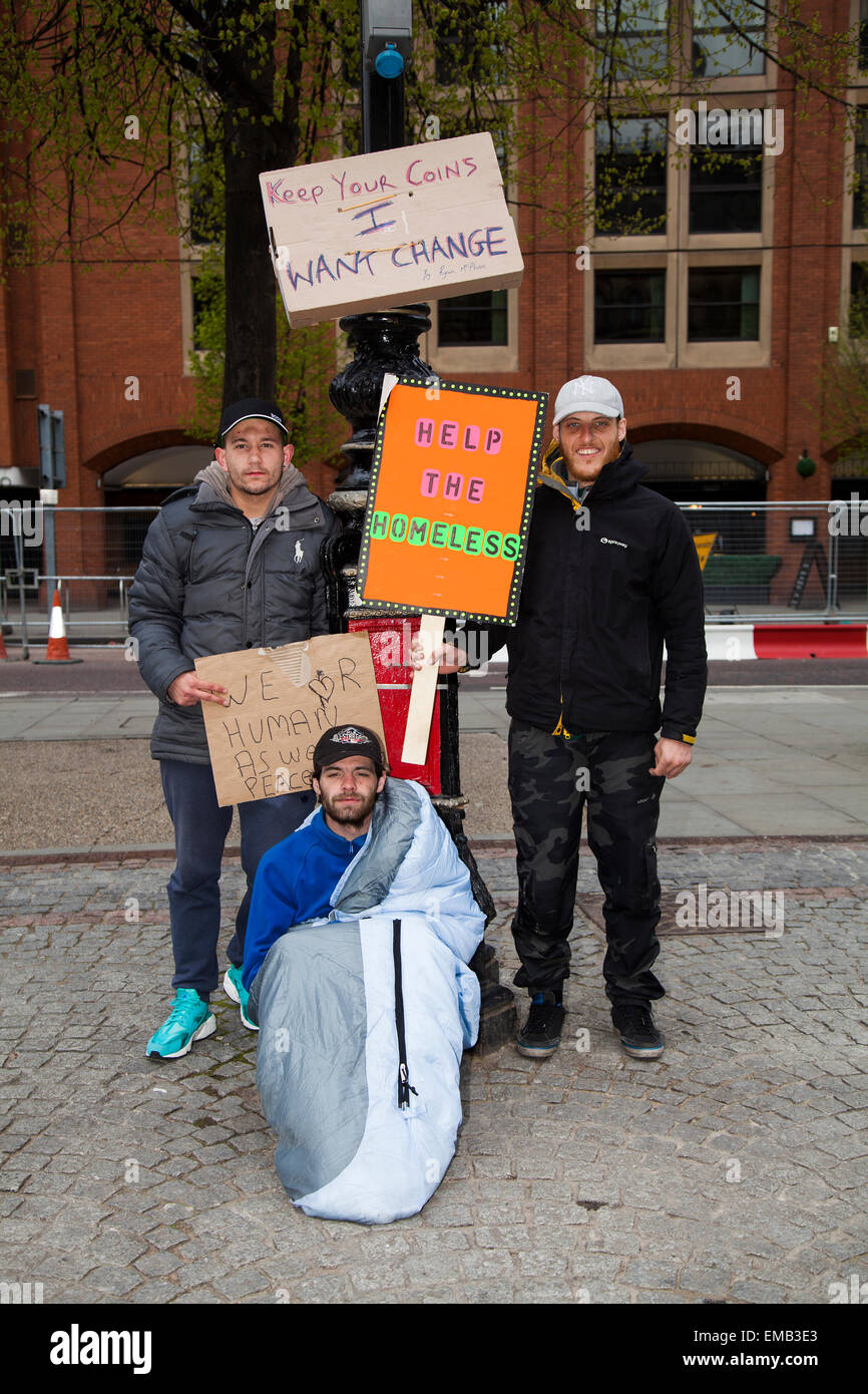 Manchester, UK 19th April, 2015. Homeless campaigners continue to make a stand outside Manchester Town Hall to raise awareness of the crisis in temporary housing.  Demonstrators are sleeping in tents in an encampment in Albert Square; many have recently been released from prison and have no hope of accommodation. The group, called Homeless Rights of Justice, have a court appearance on Monday to be evicted, after which they will have 48 hours to leave. Stock Photo