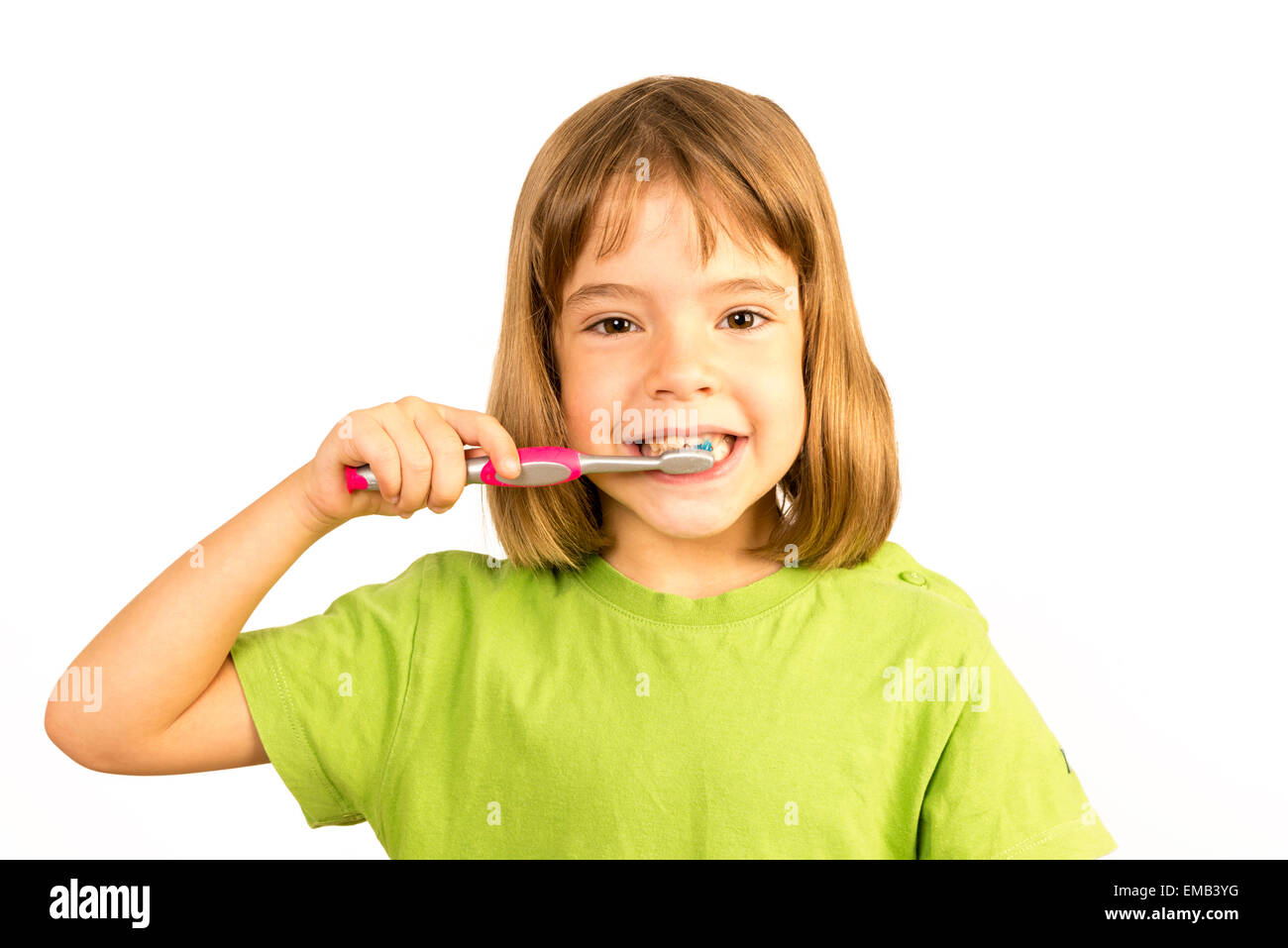 Portrait of a little girl brushing his teeth Stock Photo