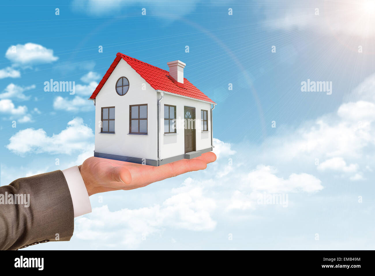Shot of man holding house model Stock Photo - Alamy