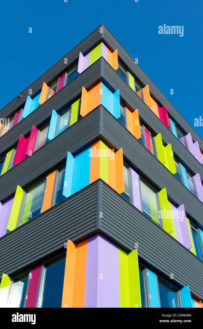 Modern building painted in a very bright and vibrant color Stock Photo -  Alamy