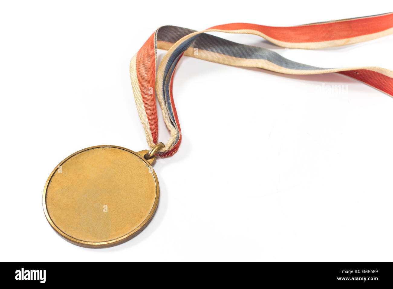 Vintage gold sport medal  on white Stock Photo