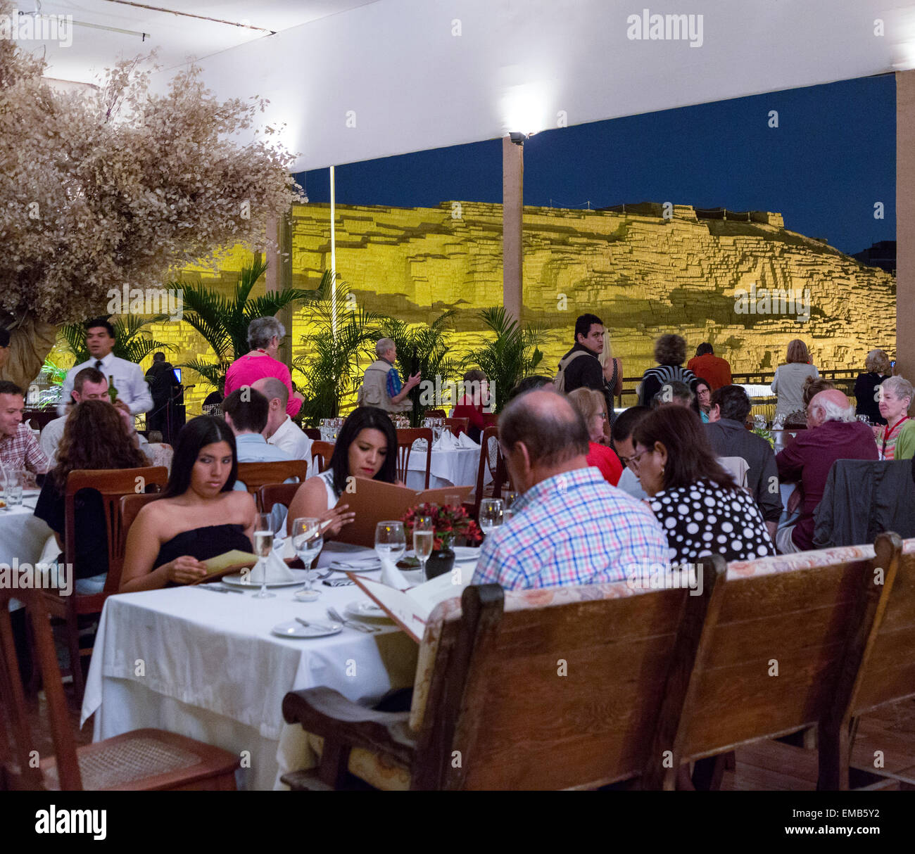 Peru, Lima, Miraflores.  Huaca Pucllana Restaurant.  Pyramid Ruins of Lima Culture, 3rd-8th. Century AD in background. Stock Photo