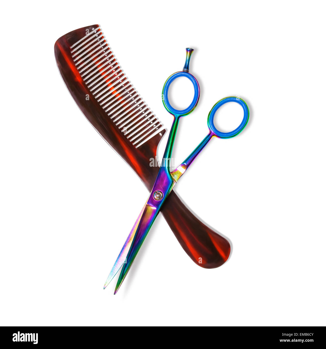 Scissors and comb isolated on white background. Professional hairdresser tools. Objects with clipping path Stock Photo