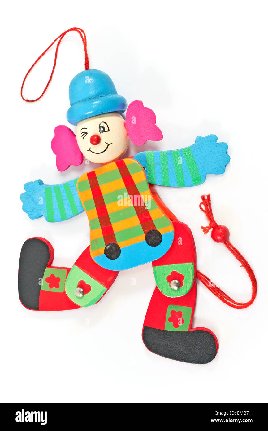 Mechanical clown toy on string  isolated on white Stock Photo