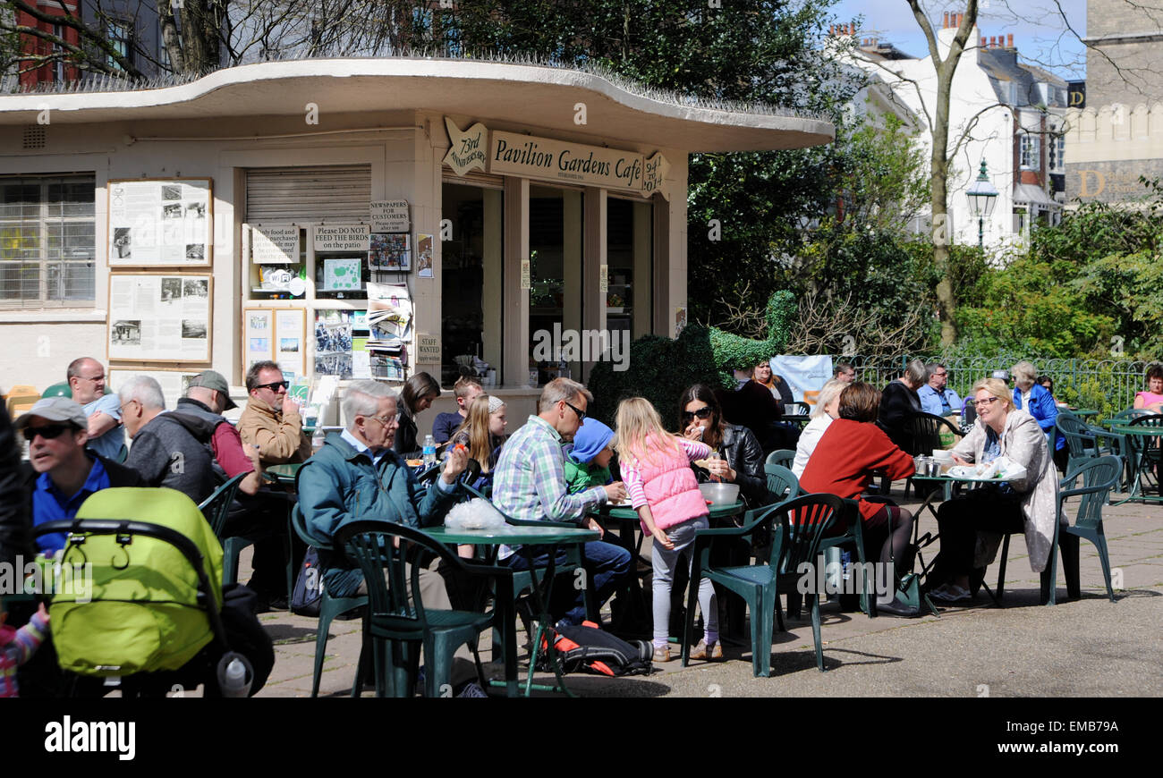 Brighton, Sussex, UK. . Visitors enjoy a cuppa in the sunshine at the famous Pavilion Gardens