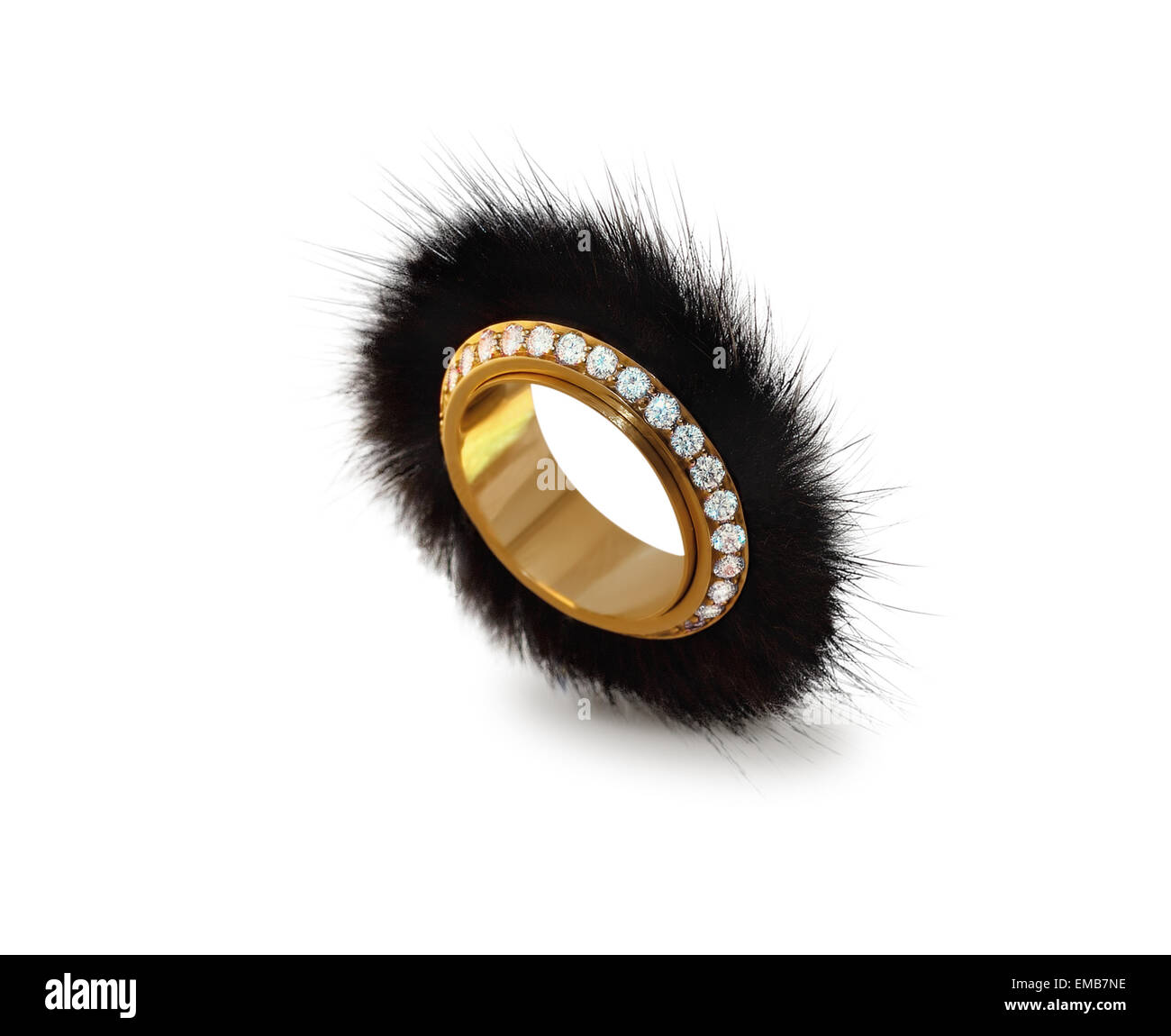 golden ring with diamonds and mink Stock Photo