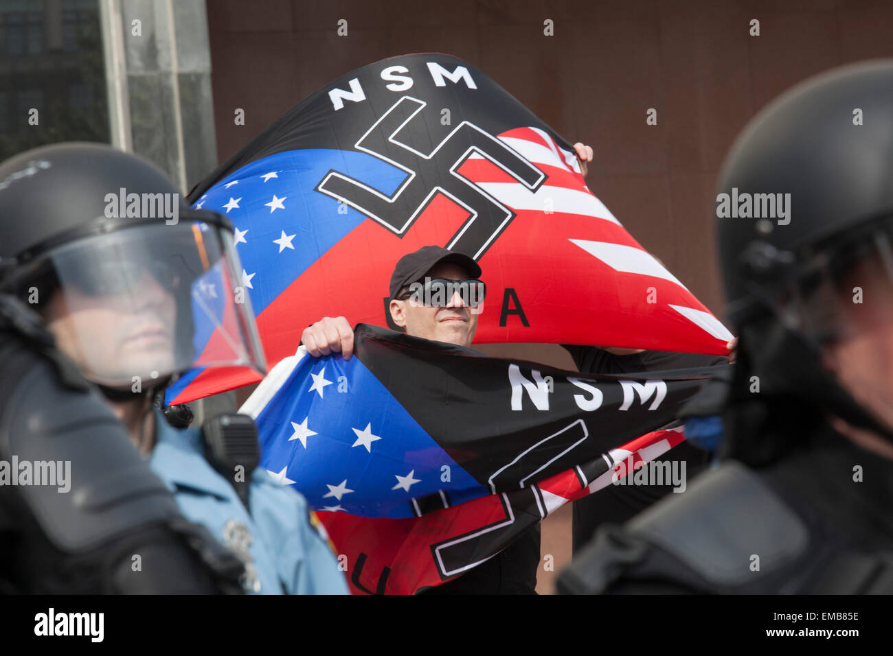 Toledo, Ohio USA - 18 April 2015 - Protected by hundreds of police, the neo-Nazi National Socialist Movement held a rally on the steps of the government office building. Several hundred people turned out to protest the Nazis. Credit:  Jim West/Alamy Live News Stock Photo