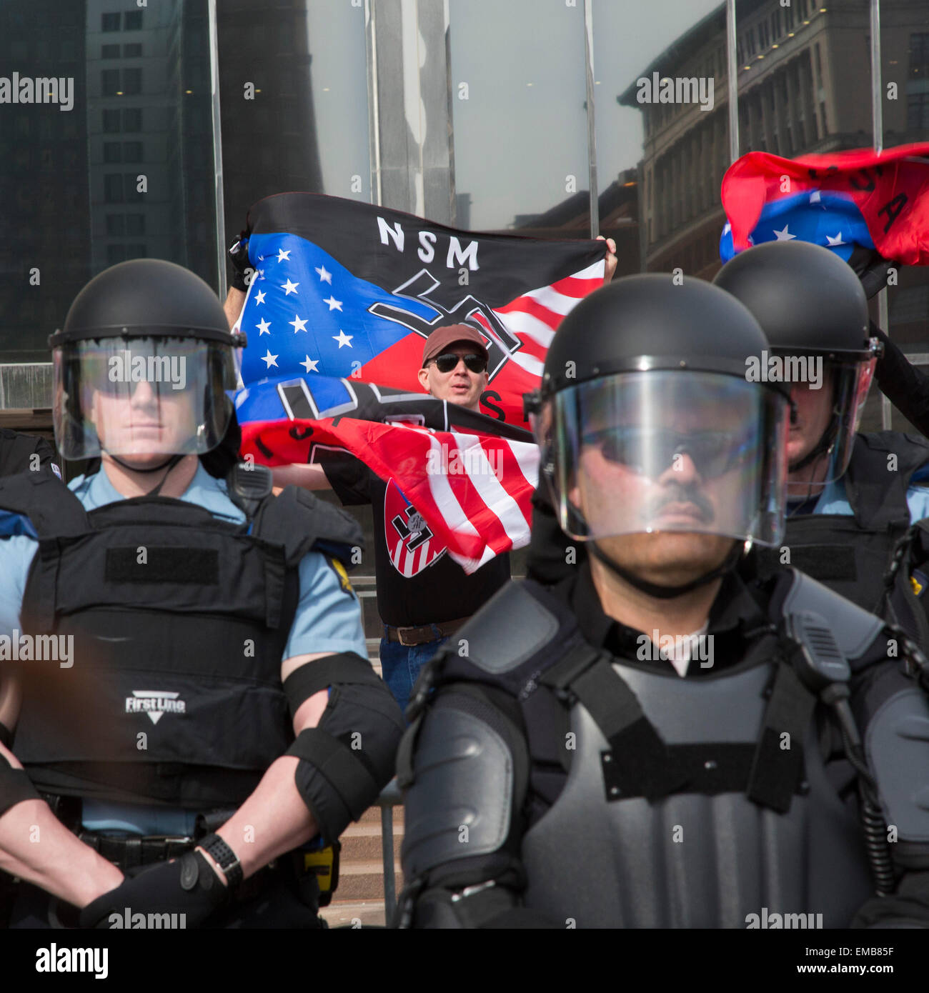 Toledo, Ohio USA - 18 April 2015 - Protected by hundreds of police, the neo-Nazi National Socialist Movement held a rally on the steps of the government office building. Several hundred people turned out to protest the Nazis. Credit:  Jim West/Alamy Live News Stock Photo