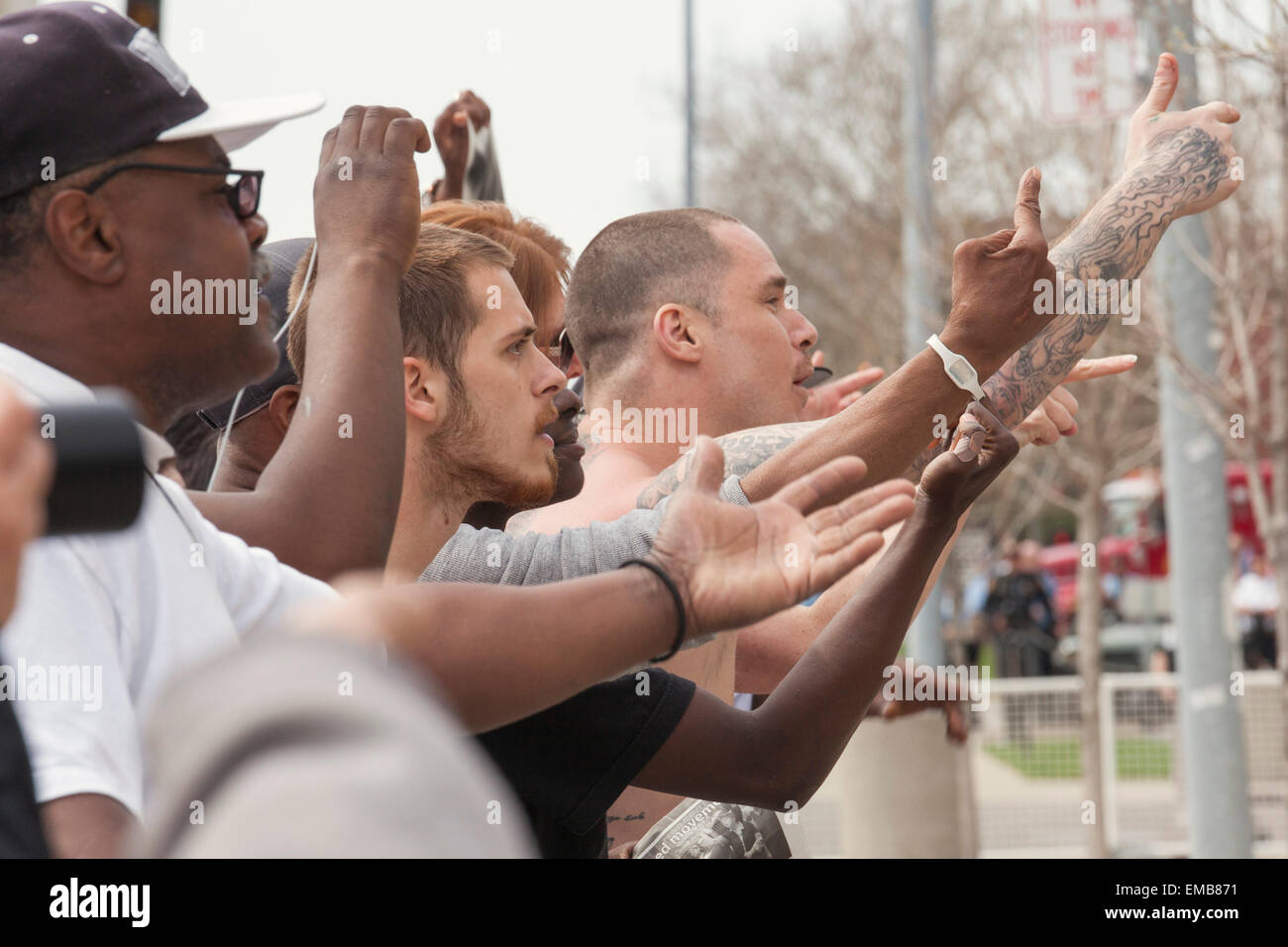 Toledo, Ohio USA - 18 April 2015 - Several hundred people turned out to protest as the neo-Nazi National Socialist Movement held a rally on the steps of the government office building. Credit:  Jim West/Alamy Live News Stock Photo