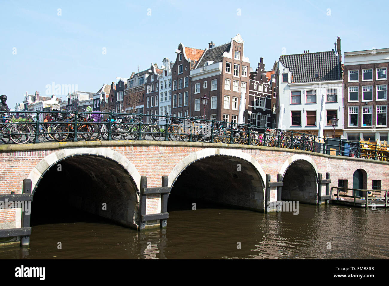 Torensluis bridge, oldest bridge in the city, over the Singel canal in Amsterdam. Stock Photo