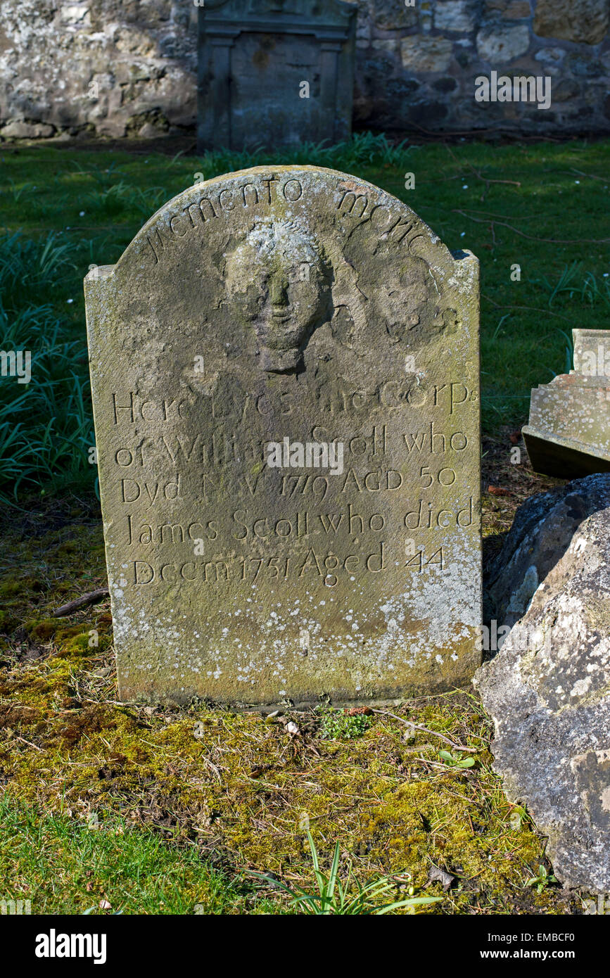 An 18th century headstone in the graveyard of St Mary's Kirk in Ratho