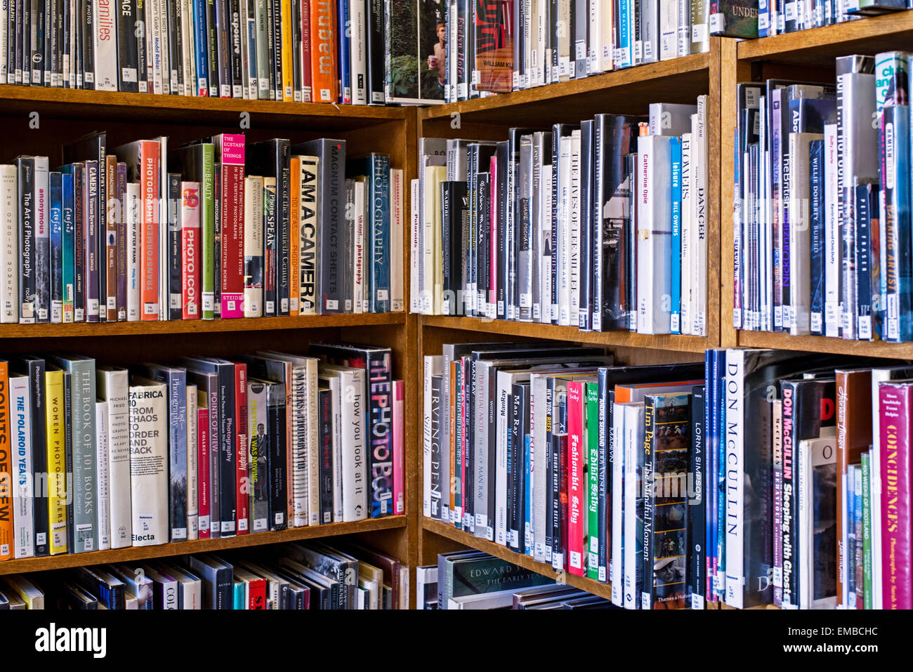 Library shelves containing books on photography. Stock Photo