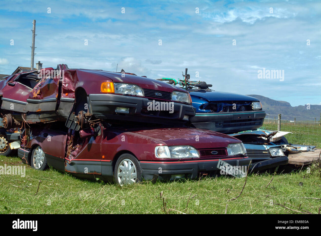 Junk cars on a junkyard Scotland United Kingdom Europe Stock Photo Alamy