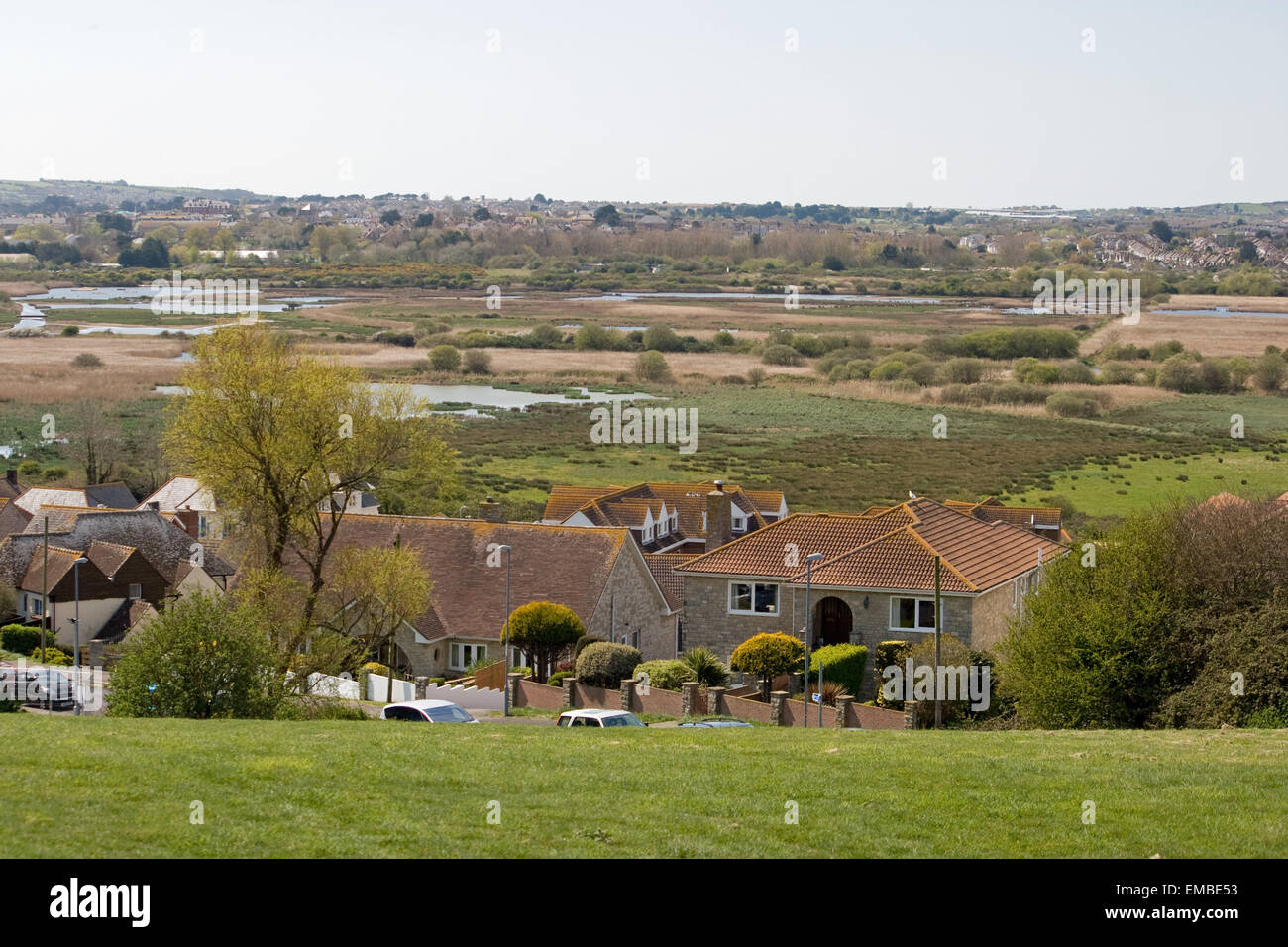 View of Lodmoor nature reserve, Weymouth. Looking from the hill at Bowleaze. Stock Photo