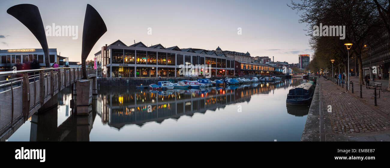 A panoramic of the restaurants along Harbourside at dusk in Bristol City Centre, UK Stock Photo