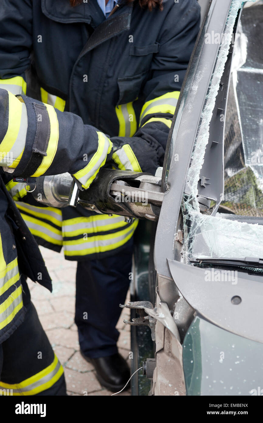 Rescue operation of the fire brigade on a car Germany Stock Photo