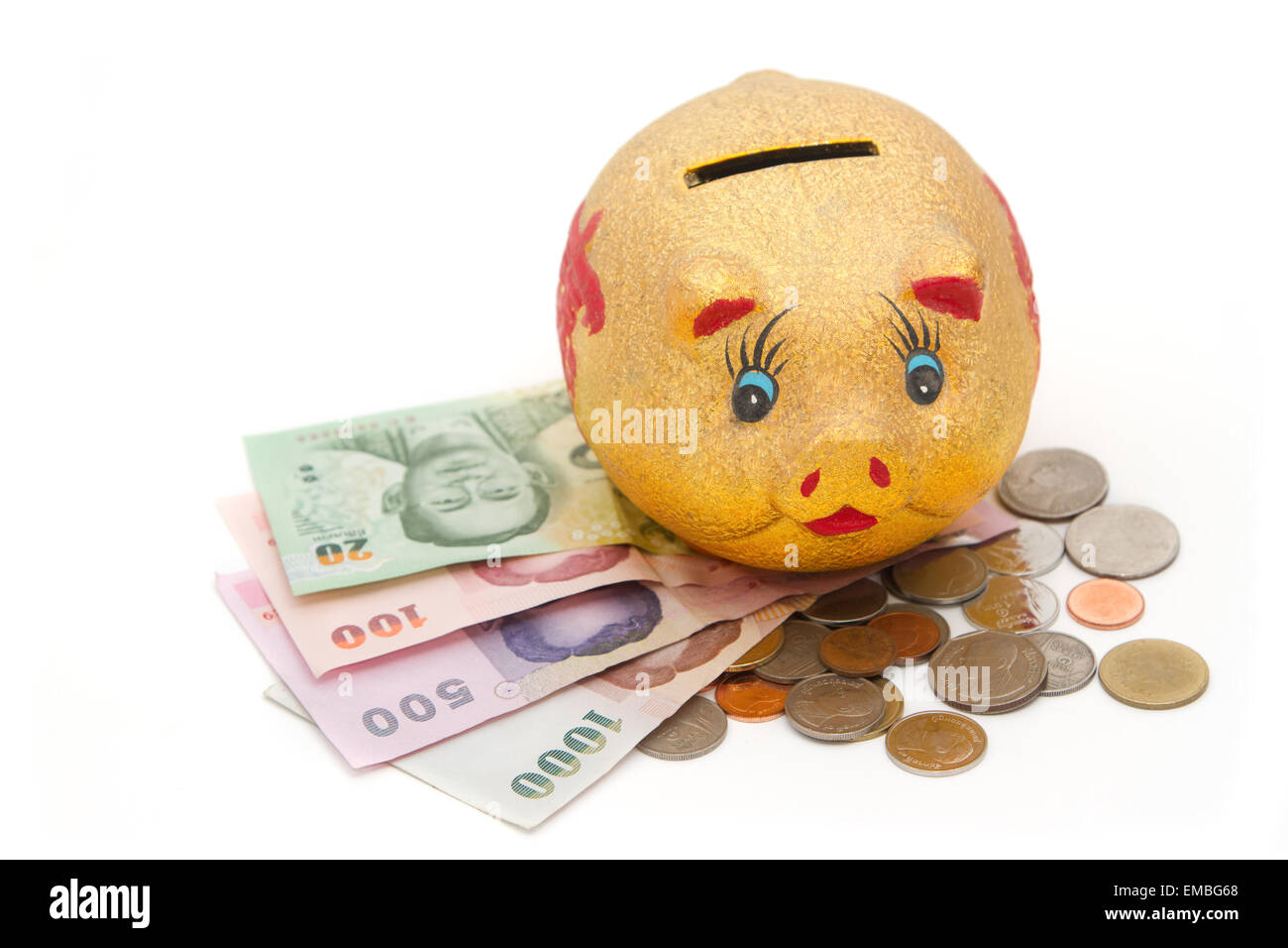 Piggy bank with coins and banknotes Stock Photo