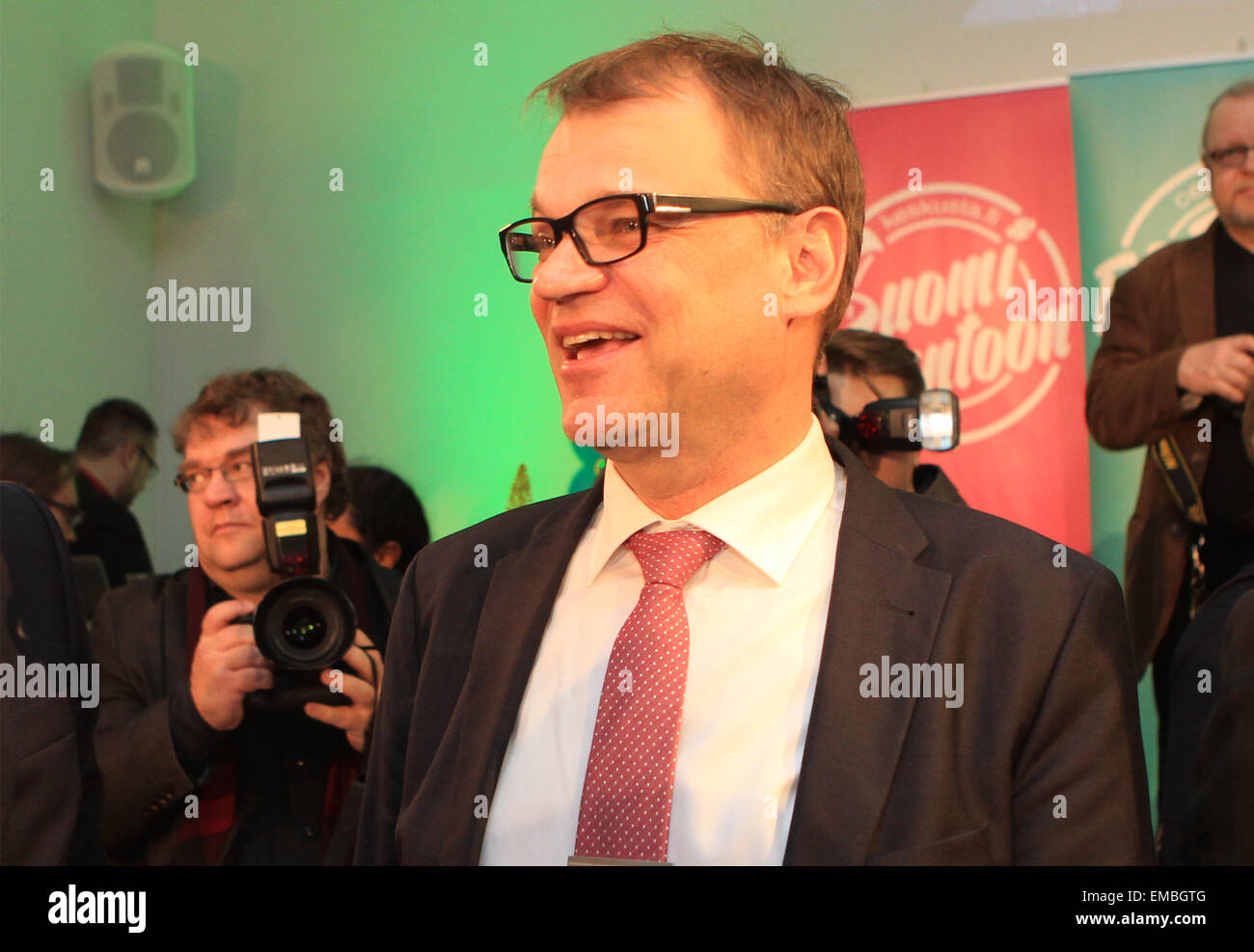 Helsinki. 19th Apr, 2015. The Center Party chair Juha Sipila celebrates with colleagues in Helsinki, Finland on April 19, 2015. Finland's Center Party was predicted by Finnish national broadcaster Yle to be the winner of Sunday's parliamentary election. © Li Jizhi/Xinhua/Alamy Live News Stock Photo