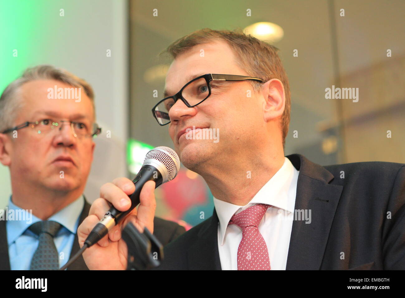 Helsinki. 19th Apr, 2015. The Center Party chair Juha Sipila (R) celebrates with colleagues in Helsinki, Finland on April 19, 2015. Finland's Center Party was predicted by Finnish national broadcaster Yle to be the winner of Sunday's parliamentary election. © Li Jizhi/Xinhua/Alamy Live News Stock Photo