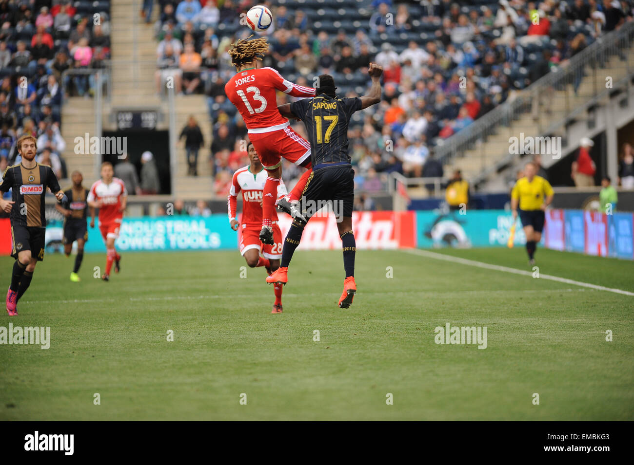 Chester, Pennsylvania, USA. 19th Apr, 2015. New England Revolution's midfielder, JERMAINE JONES (13) goes for a header against the Union's CJ SAPONG (17) The Revolution beat the Union 2-1 at PPL Park in Chester Pa Credit:  Ricky Fitchett/ZUMA Wire/Alamy Live News Stock Photo