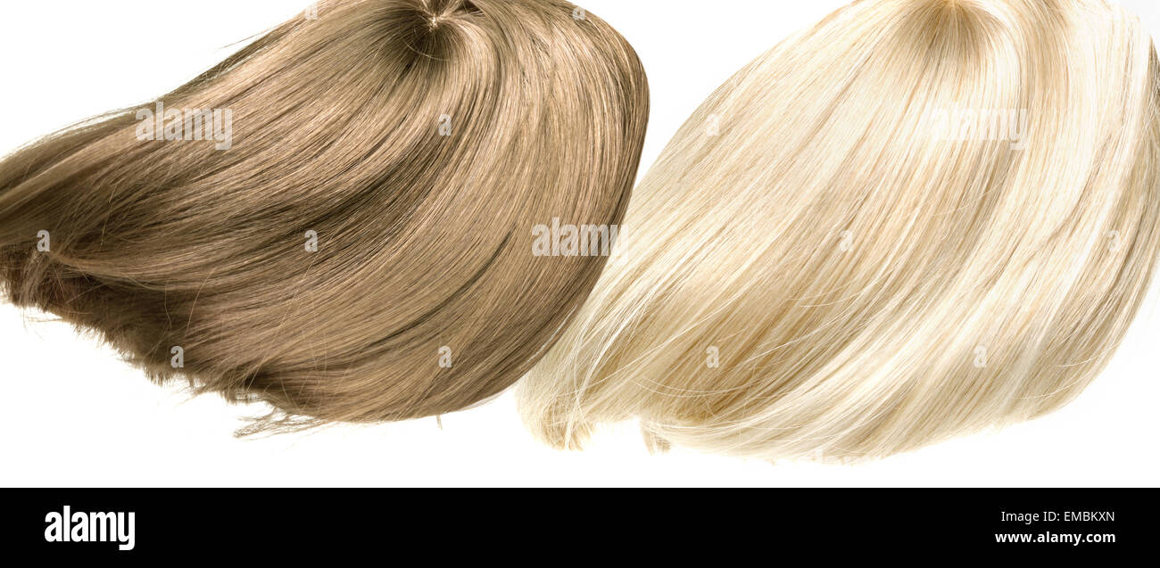 Picture presenting two straight, dense hairpieces Stock Photo