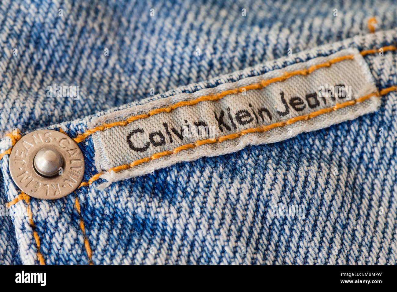 Branding label on pair of Calvin Klein blue jeans Stock Photo - Alamy