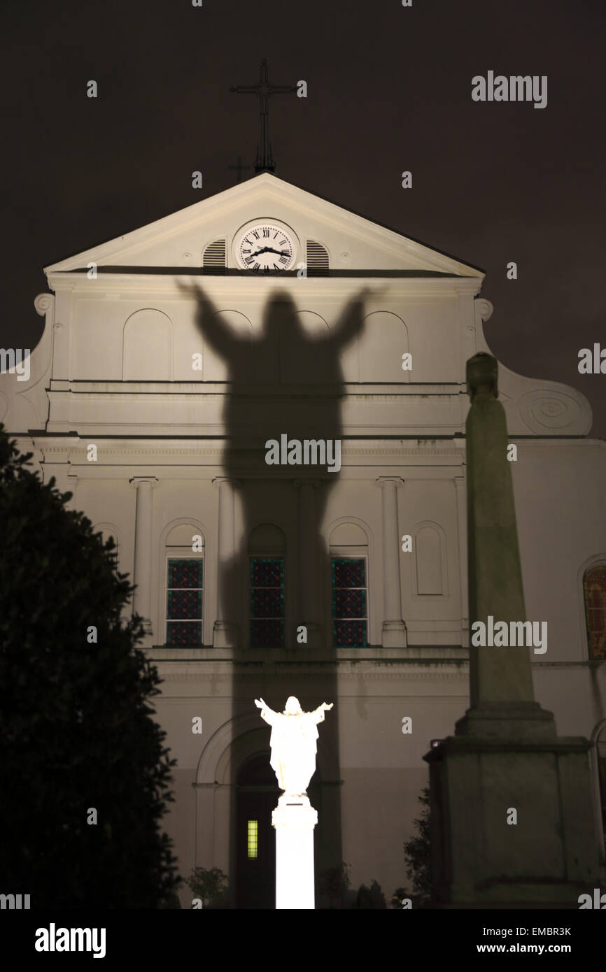 Shadow of Jesus statue behind St. Louis Cathedral aka Touchdown Jesus