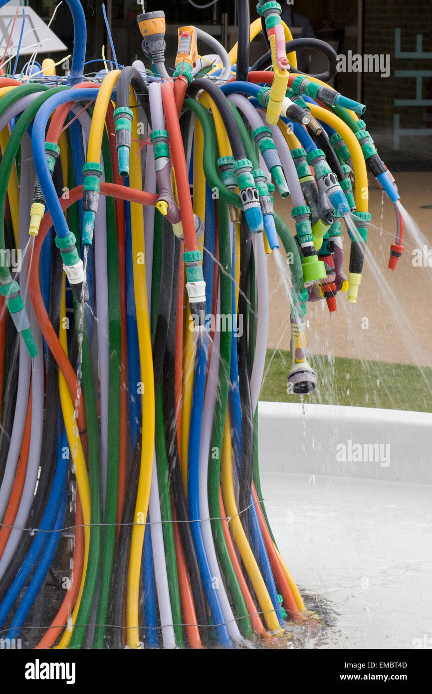 Colored Hose pipe water fountain Stock Photo Alamy