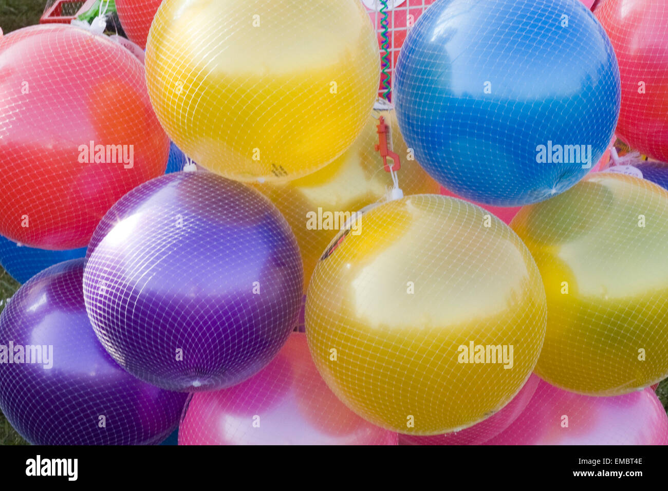 Brightly colored toy balls for sale Stock Photo Alamy
