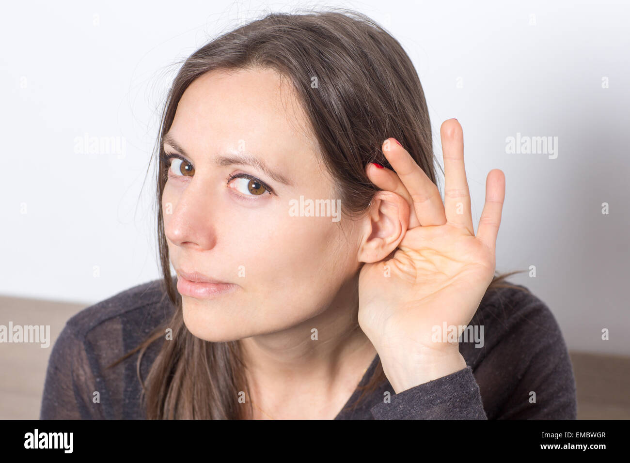 Symbol picture for listening Stock Photo - Alamy