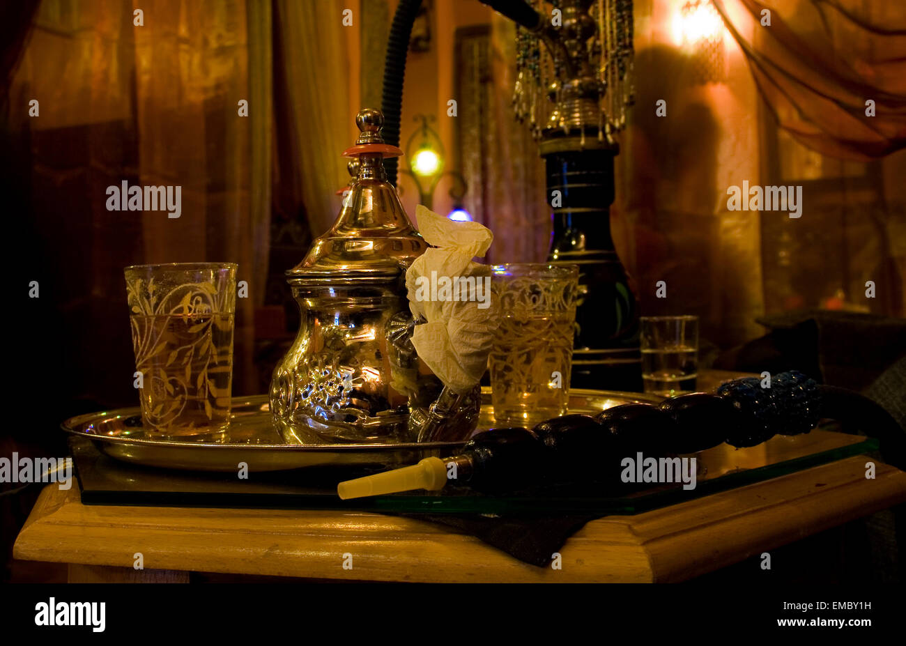 Arabic water pipe with tea set in beautiful arabic decor at Granada