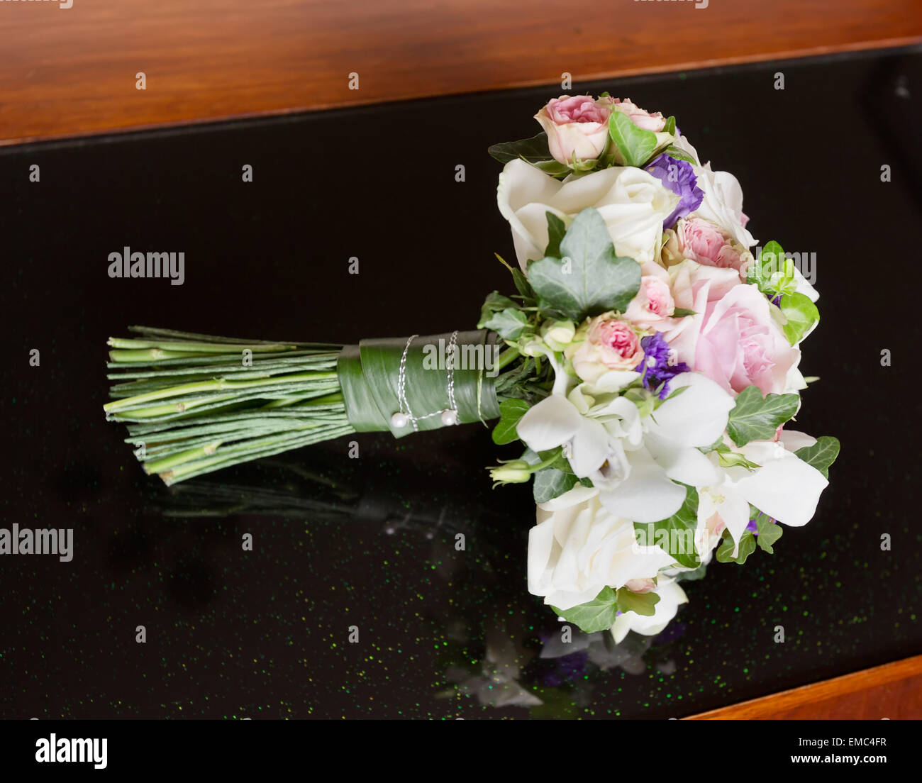 Close up view - floral cutter and colorful flowers bouquet - roses on table  at studio, flower shop. Floristry, romantic, birthday, handmade and small  Stock Photo - Alamy