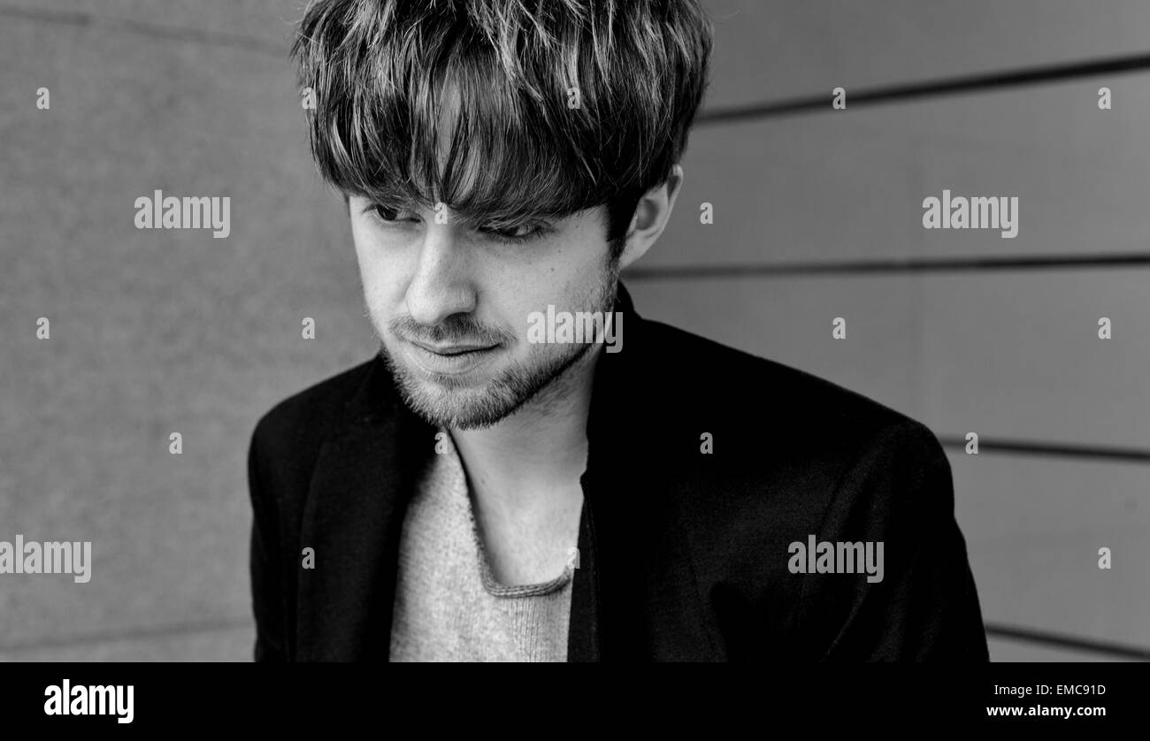 Portrait of sad young man Stock Photo - Alamy