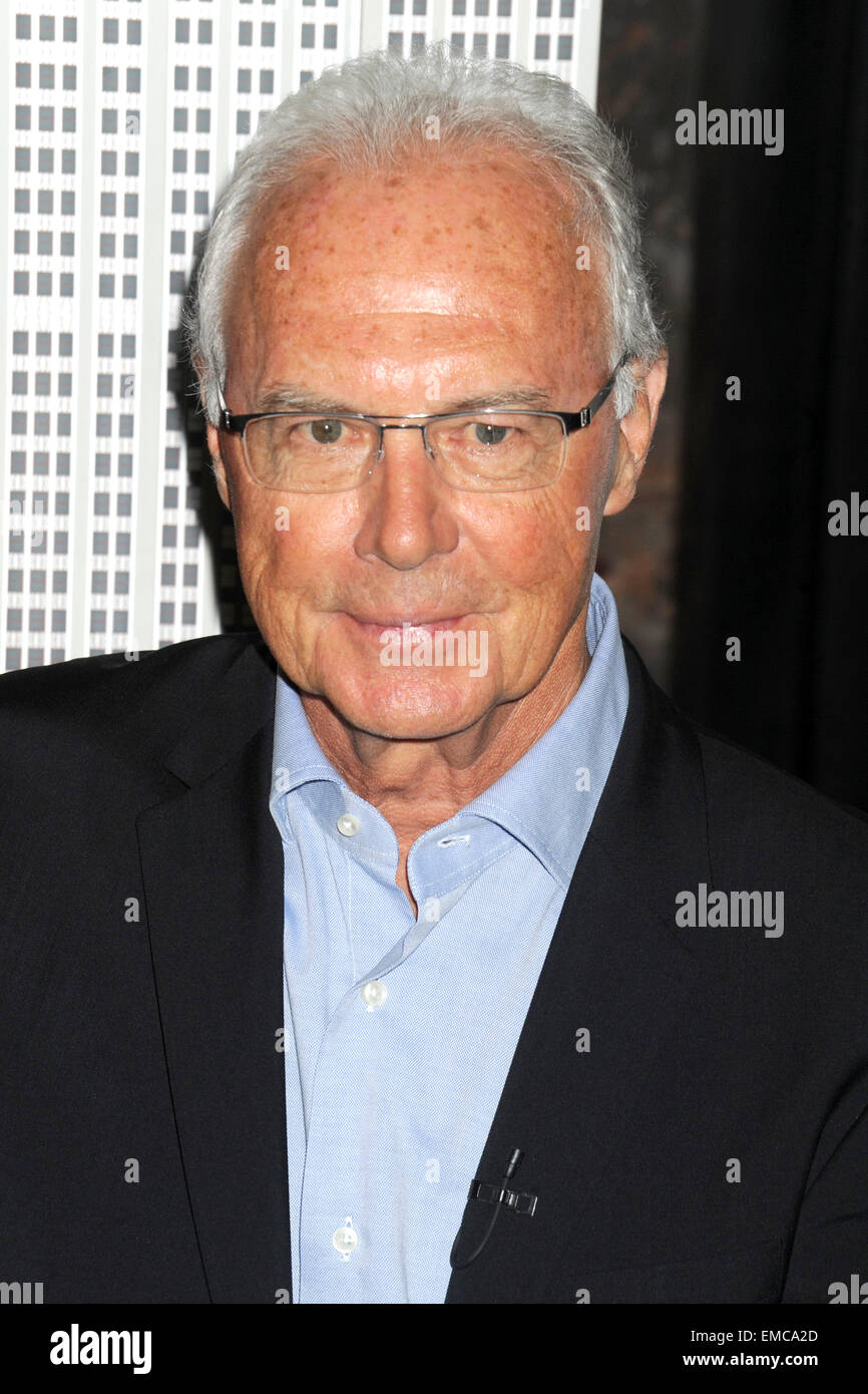 The New York Cosmos legend Franz Beckenbauer lights the Empisre State