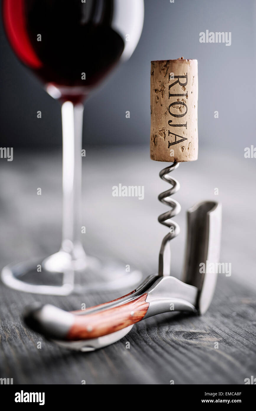 Glass of red wine, corkscrew and wine cork with the word 'Rioja' Stock Photo