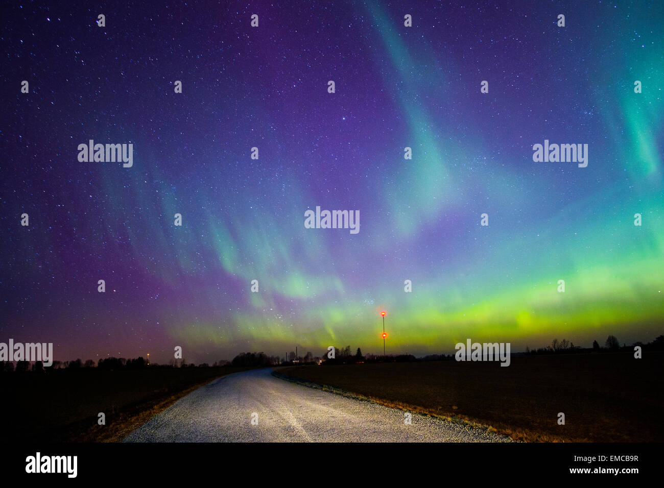 Northern lights shining over green hi-res stock photography and images ...