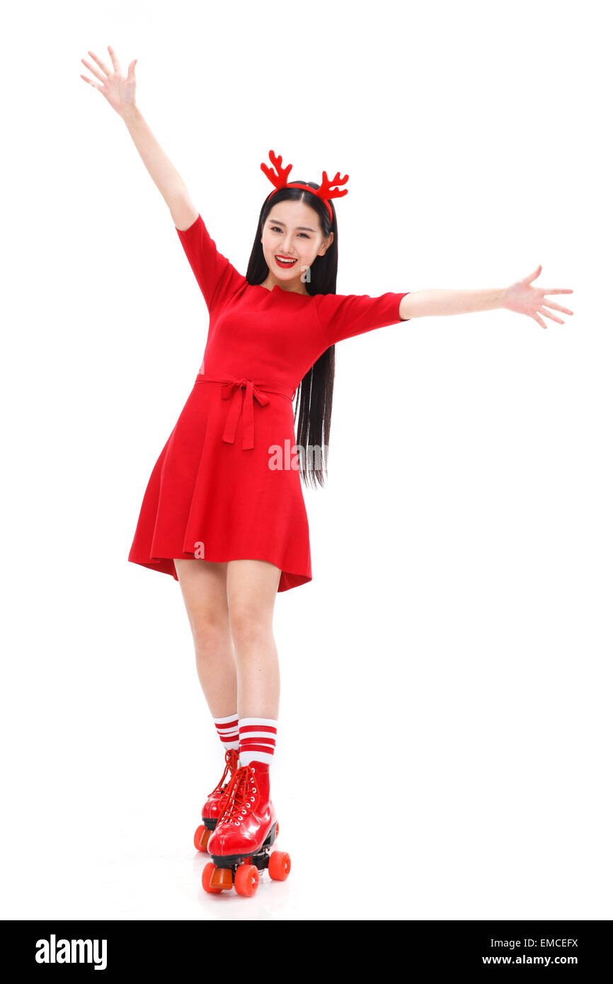 The young woman in the roller skating Stock Photo