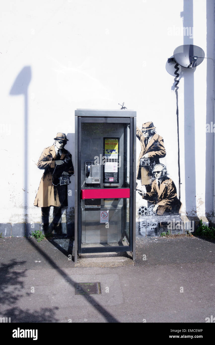 Banksy's 'spy booth' artwork appeared in Cheltenham, Gloucestershire in April 2014. Stock Photo