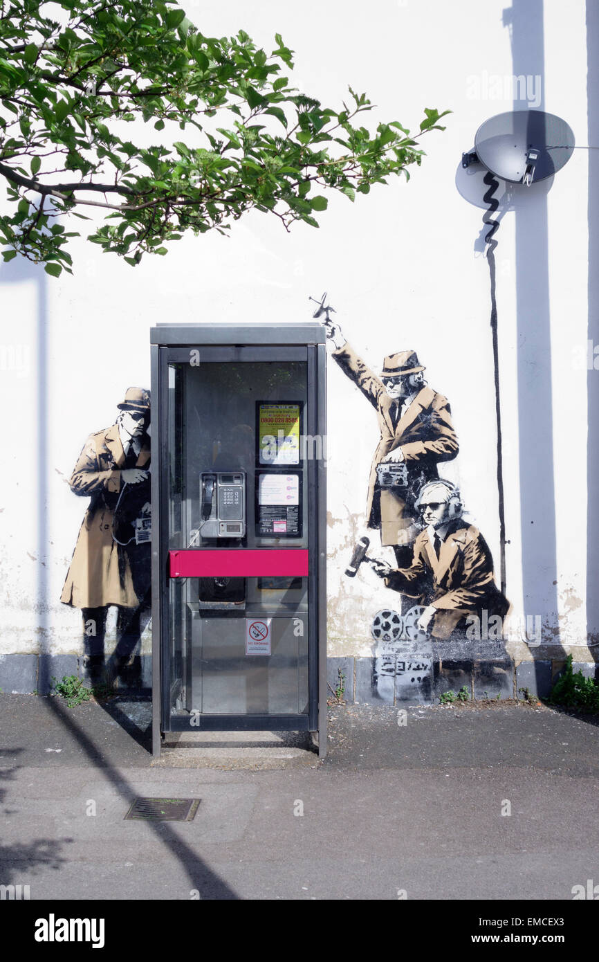 Banksy's 'spy booth' artwork appeared in Cheltenham, Gloucestershire in April 2014. Stock Photo