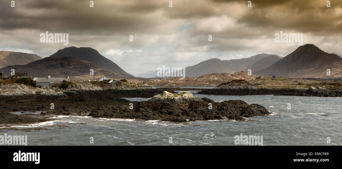 Ireland, Co Galway, Connemara Loop, Lettermore, view across coastal inlet to the Twelve Bens Stock Photo