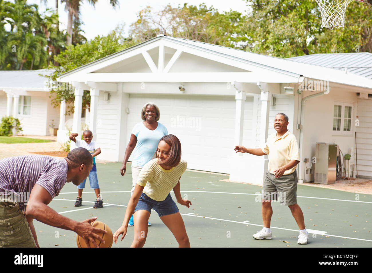 Multi Generation Family Playing Basketball Together Stock Photo - Alamy